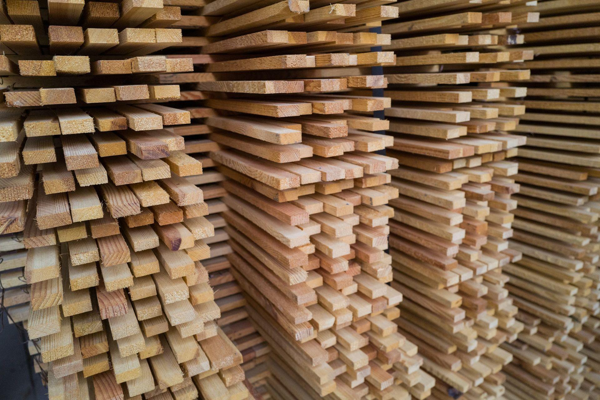 Stacked tropical hardwood timber ready for export at the Kayu Merapi Internusa yard
